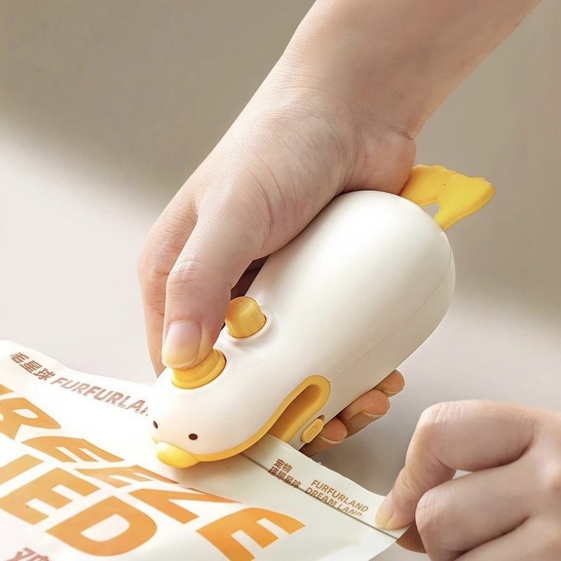 Food Snacks In Usa - Scelleuse manuelle rechargeable en forme de